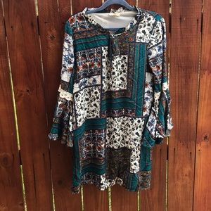 Boutique tunic top. Size large. Floral print